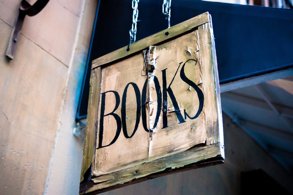 A sign that says 'Books' to indicate the new additions